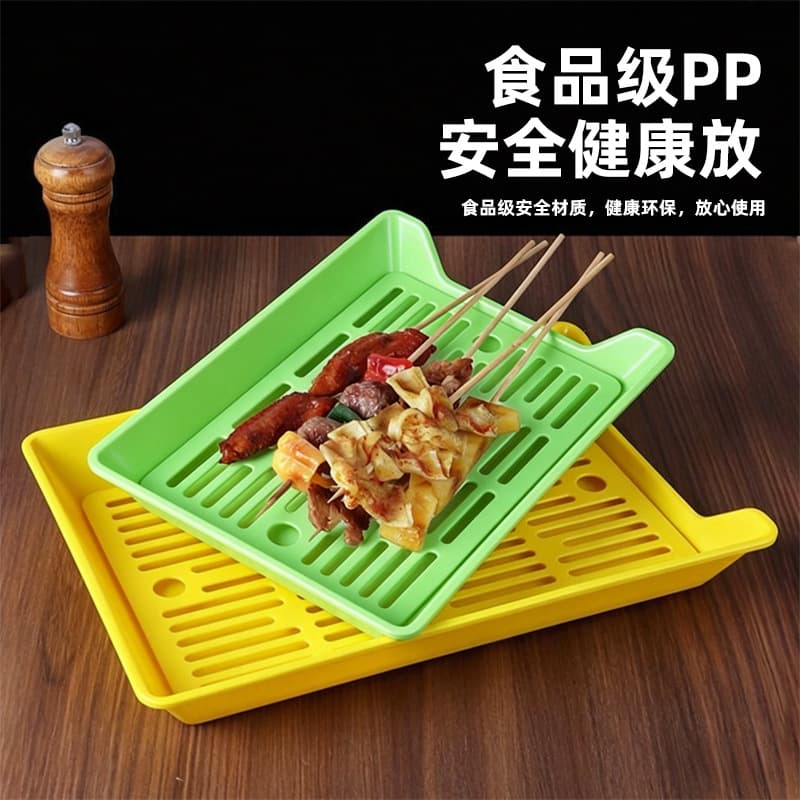 Rectangular food-grade plastic barbecue skewer tray with filter, drop-resistant, suitable for night market barbecue stalls.