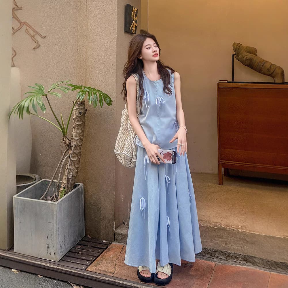 This year's popular French bow blue sleeveless suit skirt women's summer dress is paired with a two-piece skirt set