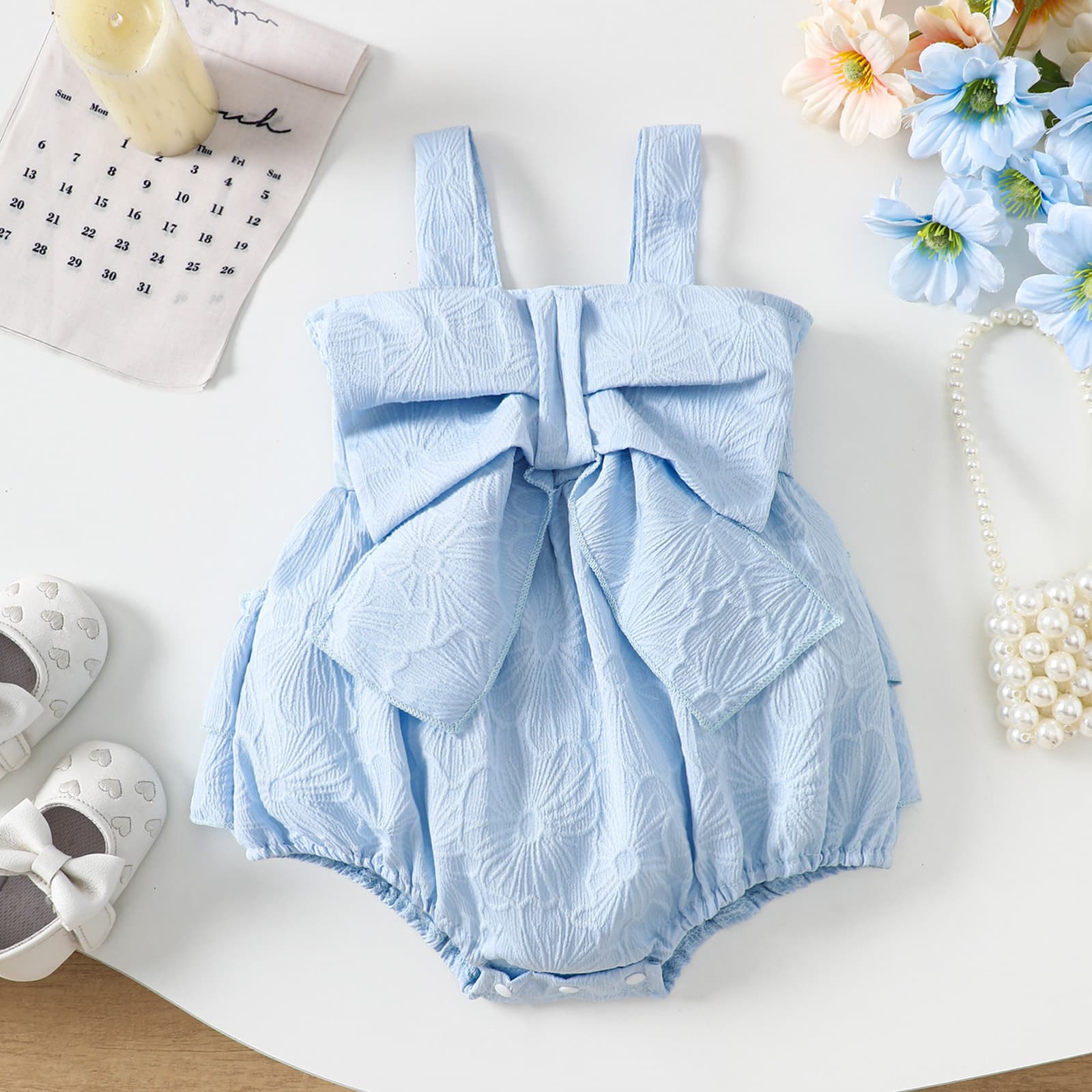 2025 Summer New Baby Girl Clothes INS Style Solid Color Floral Pattern Bowknot Strap Romper Wholesale