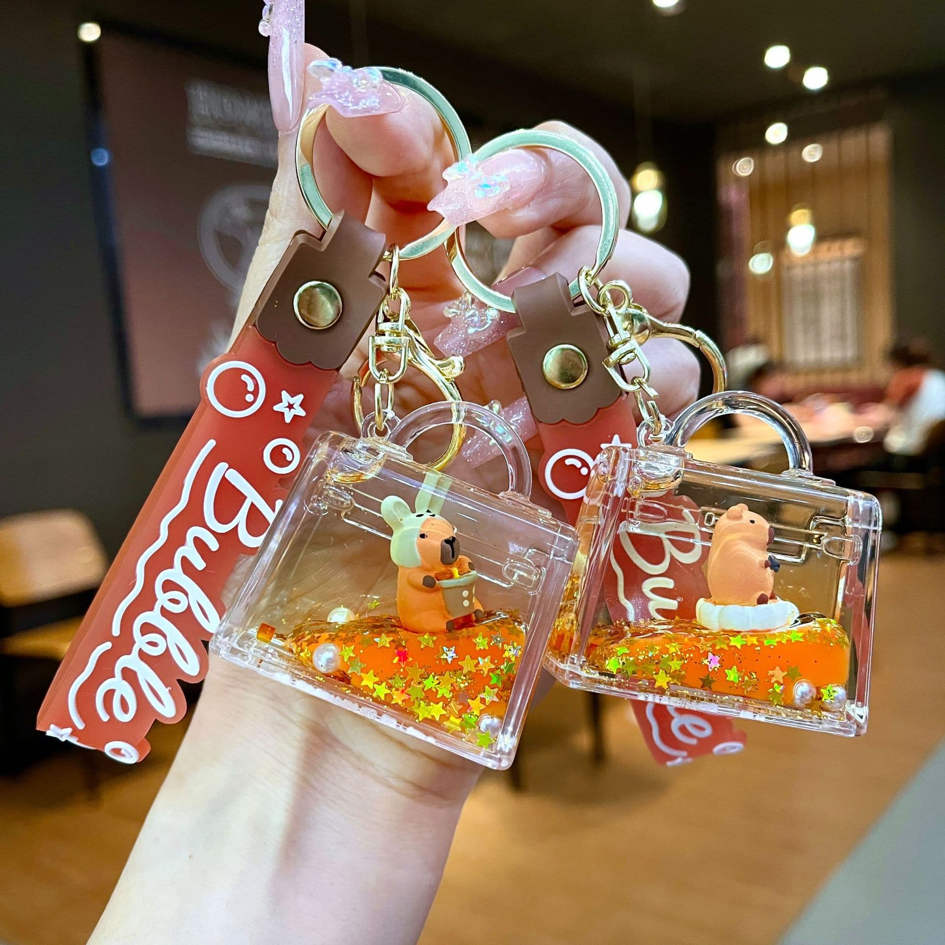 Acrylic Black Gold Oil-Filled TV Capybara Sand Bottle Keychain Cute Capybara Drift Bottle Bag Charm