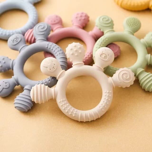 Cross-border palm baby teether, oral baby teething stick, soothing bracelet, chewing music, anti-eating hand silicone teether
