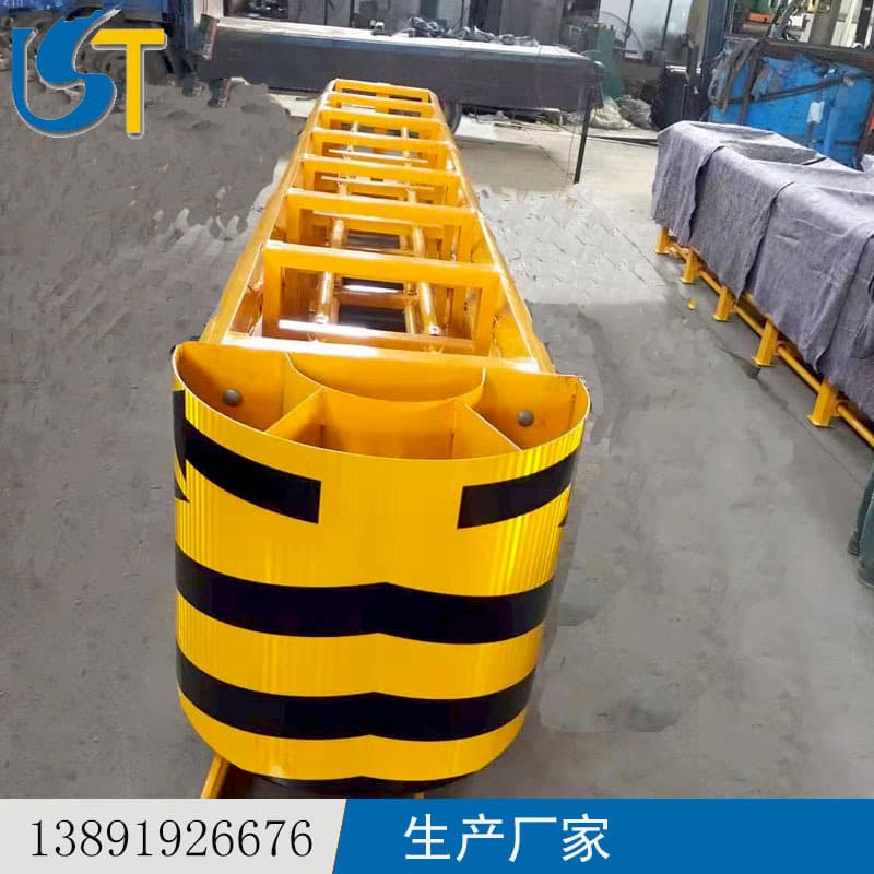 Guided crash cushions for highway toll plazas, fork road buffers, and tunnel entrance speed bumps.