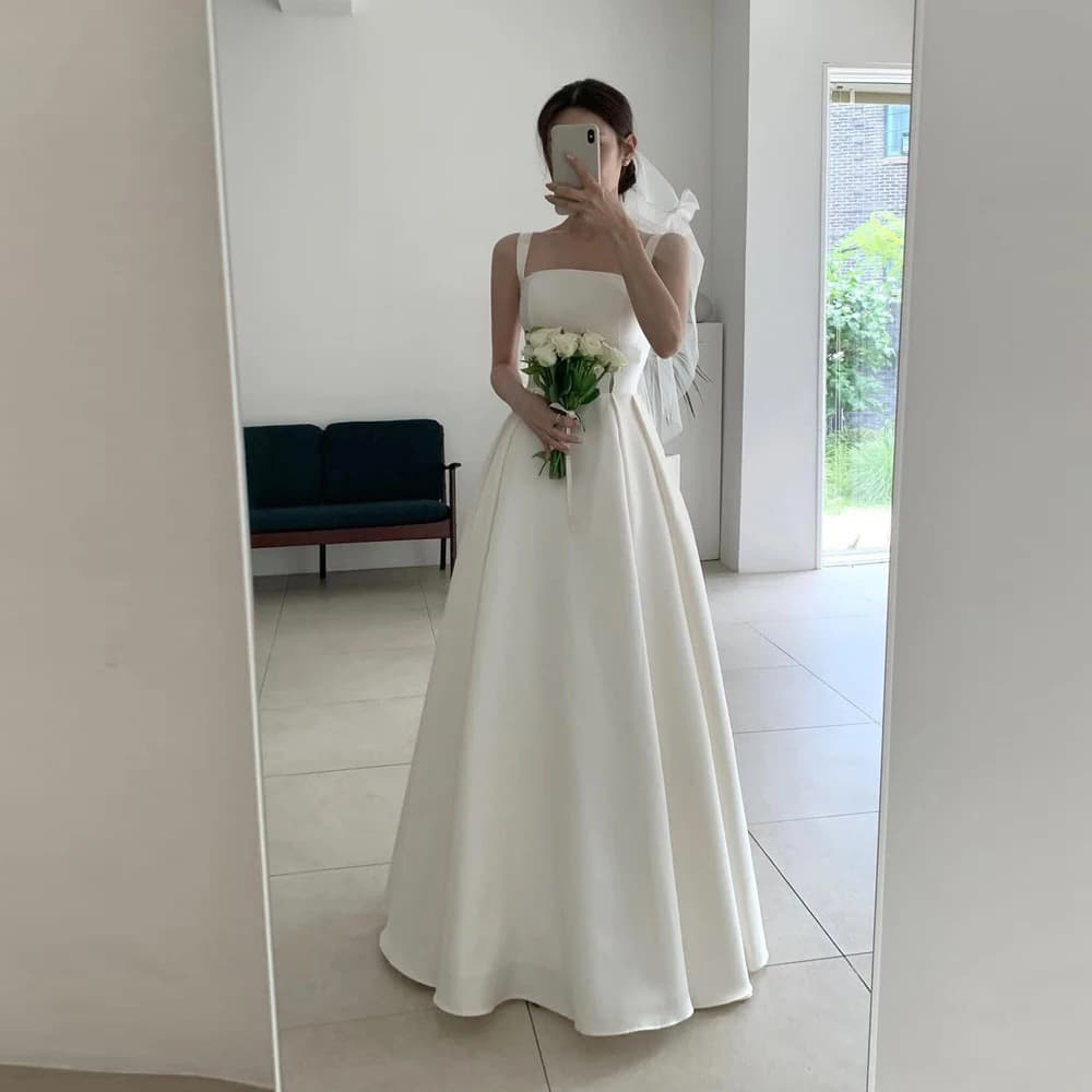 Cross-border AliExpress Spaghetti Strap White Light Wedding Dress Long Bride Engagement Forest Travel Photography Dress Elegant Wholesale