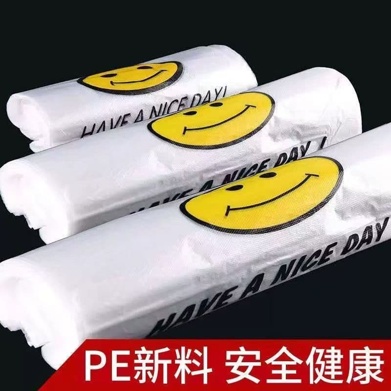 New material PE transparent white smiley face plastic bags wholesale, thickened tote bags, plastic bags, convenient shopping bags