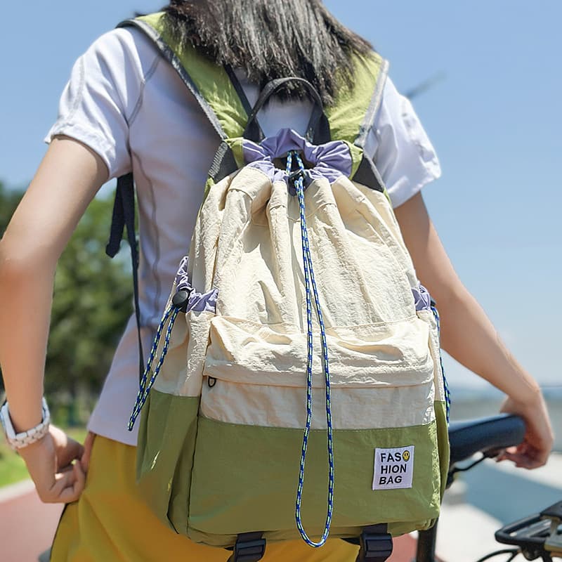 Wholesale Casual Backpacks for Women, Fashionable Color-Blocking Lightweight Drawstring Hiking Bags, Large-Capacity Travel Weight-Reducing Backpacks, Cross-Border