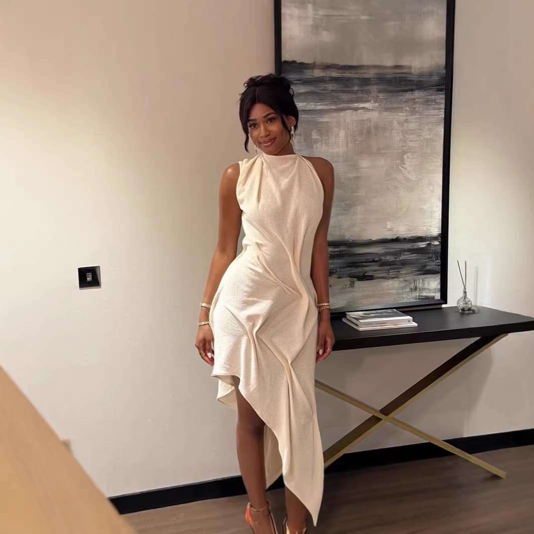 European and American cross-border 2026 spring women's fashion slim knitted pleated irregular skirt leaky back sleeveless long skirt
