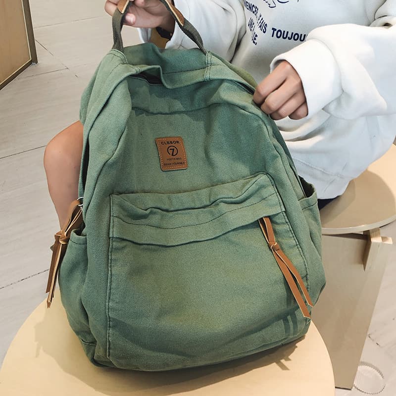 Japanese lazy style schoolbag female ins college student solid color simple backpack retro washed canvas backpack