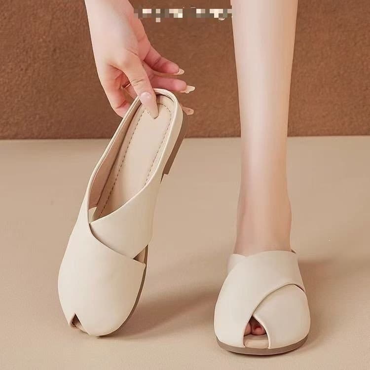 Baotou flat-soled temperament slippers new style 2026 summer cross half drag hollow Baotou lazy casual slippers