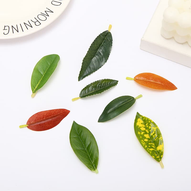 Simulated home green plant ornaments lemon leaf accessories DIY lemon tree leaves Guangdong kapok leaf manufacturer wholesale