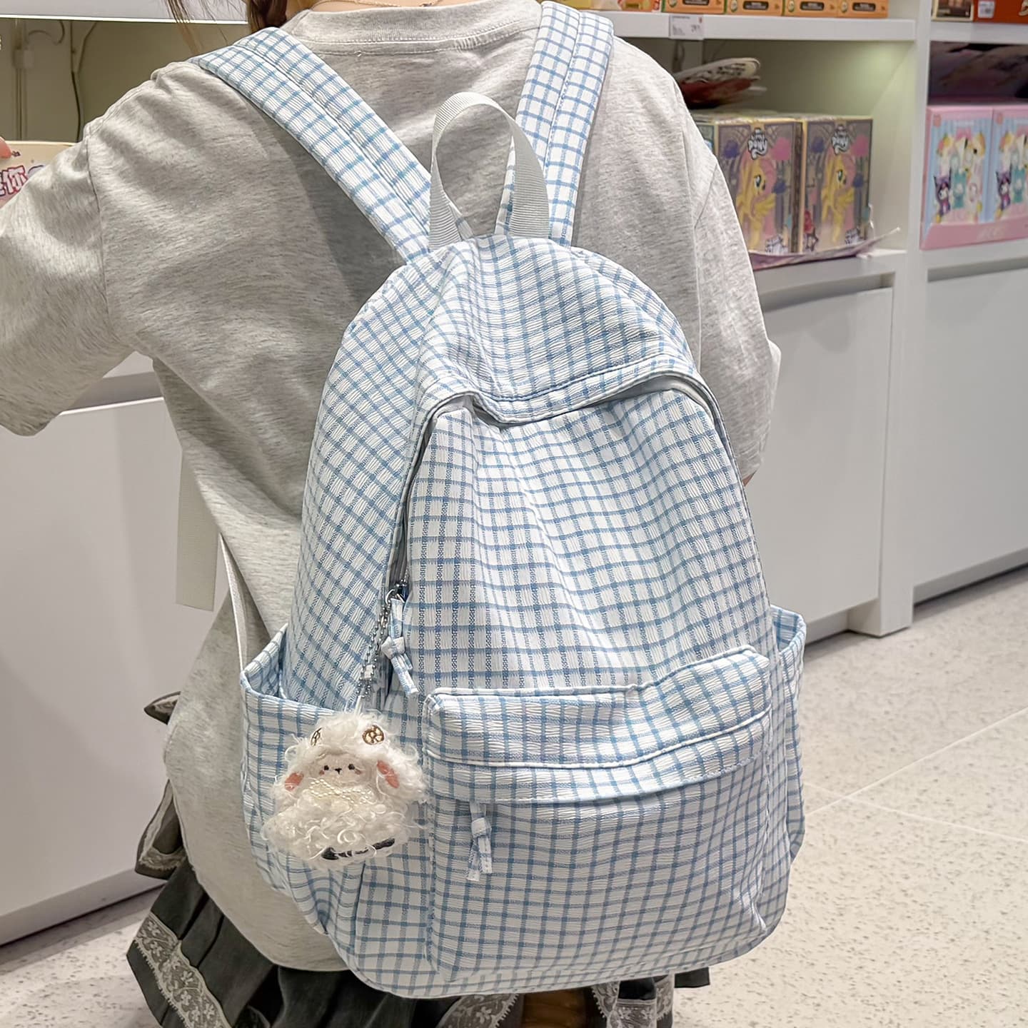 Schoolbags for junior high school girls with good looks and niche plaid large-capacity backpacks for high school, elementary school and college birthday backpacks