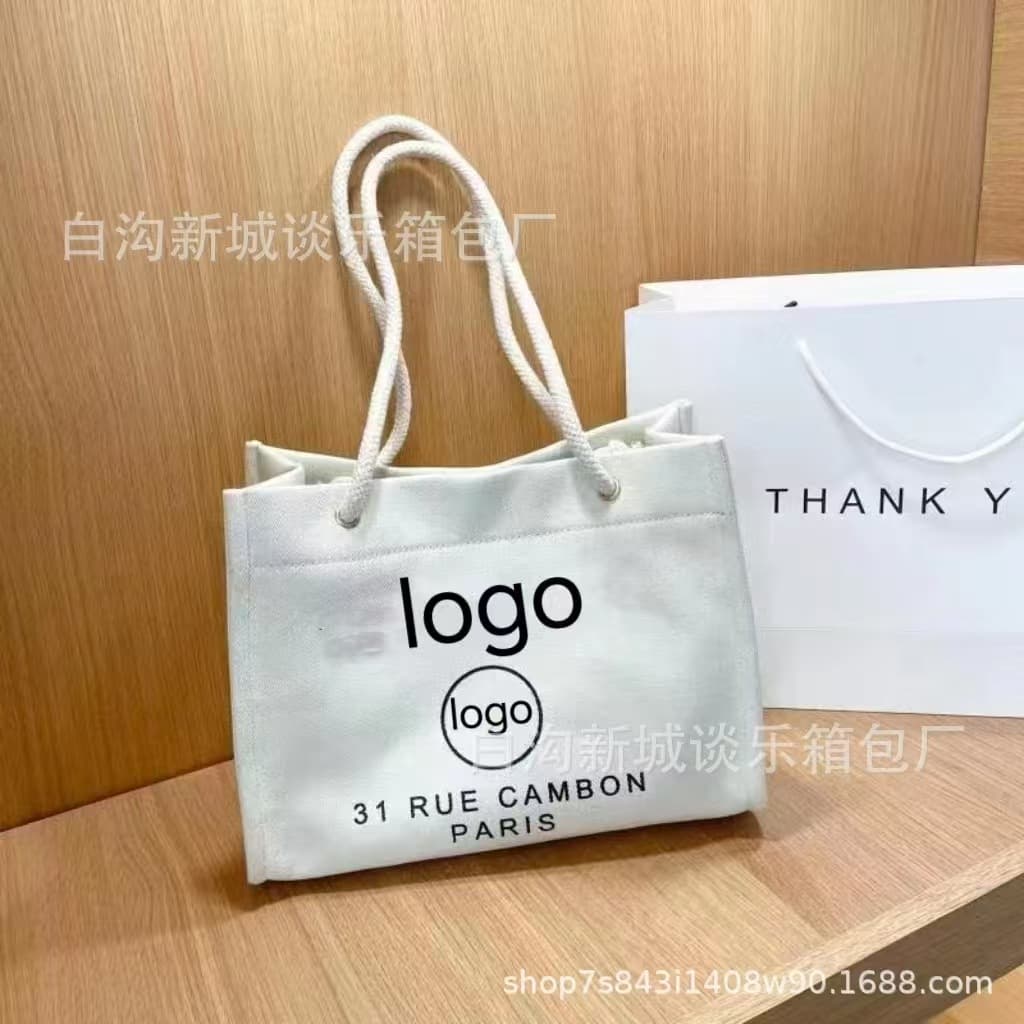2025 New Fashionable Versatile Large Capacity Handwoven Canvas Bag, Chic Tote Bag for Commuting and Shopping