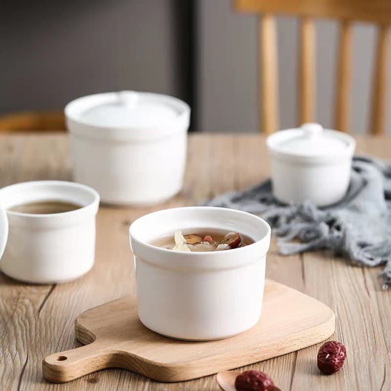 Pure white commercial stew pots, home double-boiling pots with lids, bird's nest stew pots, ceramic soup bowls, and Shaxian-style egg steaming bowls for hotels.