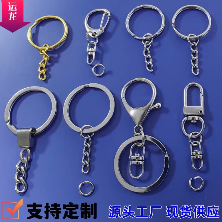 Large stock of metal key rings with chains, 25mm smooth ring, 4-link twist chain, and metal rings with chains.