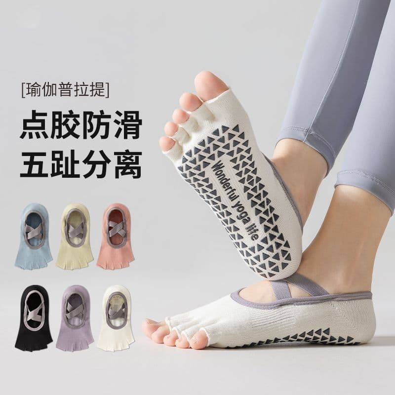 Women's silicone non-slip yoga socks with criss-cross straps, designed for breathability and comfort, perfect for yoga, exercise, and Pilates.