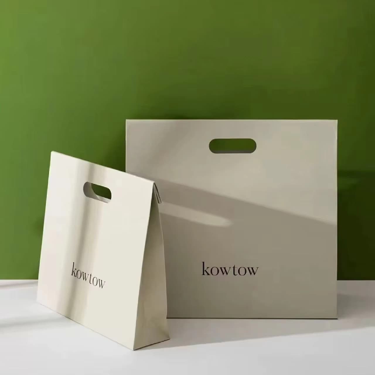 Paper bag customization High-quality environmentally friendly luxury kraft paper gift bag hand-cut design LOGO wholesale delivery