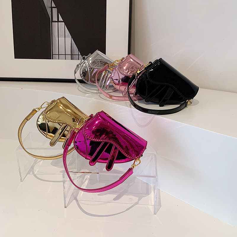 New Korean style laser glossy girl's shoulder bag, fashionable solid color children's style saddle bag, children's bag cross-border