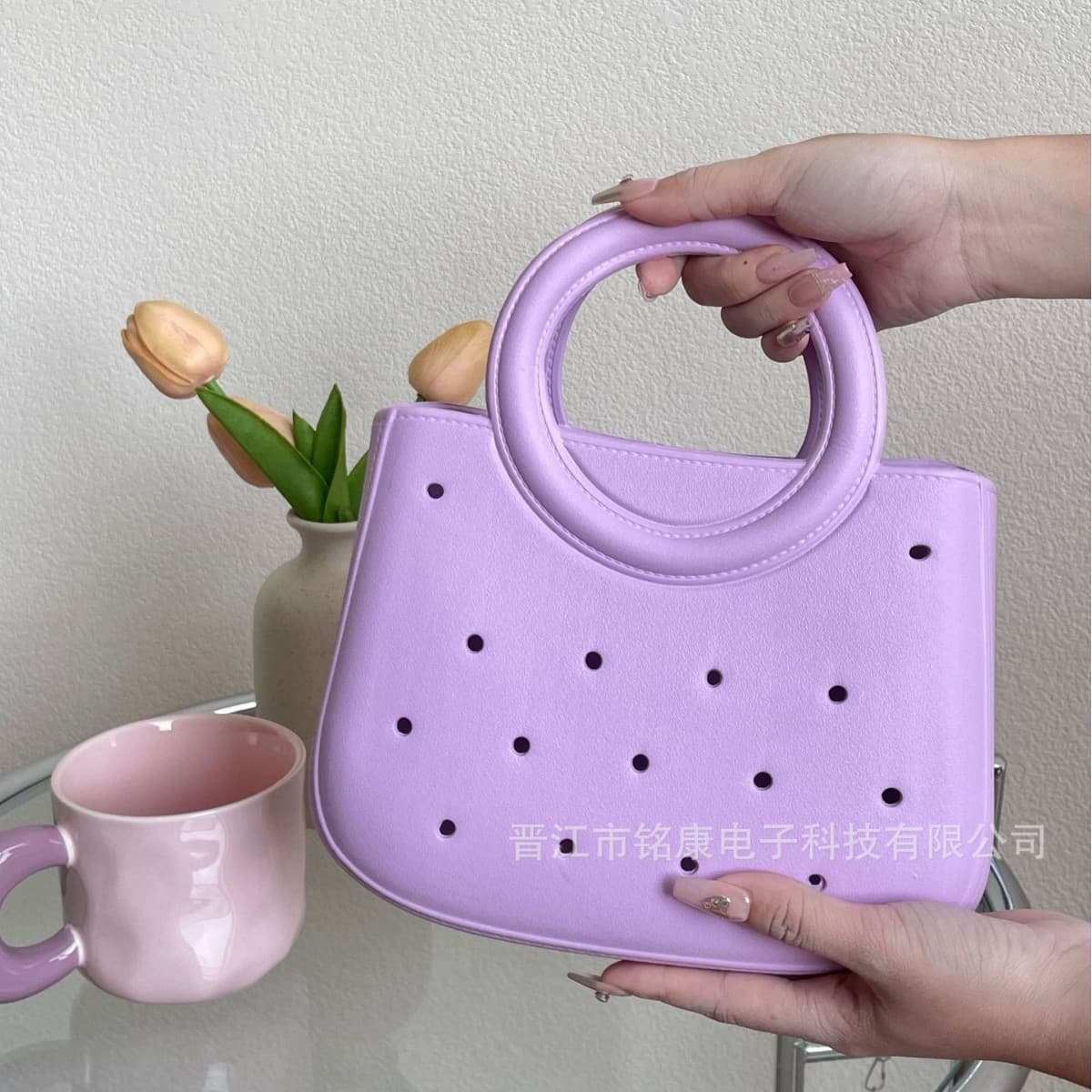 Cross-border hot selling women's handbag EVA handbag fashion round niche bag hole bag seaside eva beach bag