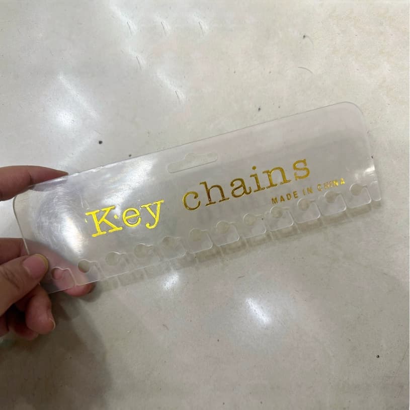 KEY chains of 12 transparent blank plastic cards for export with hot stamping