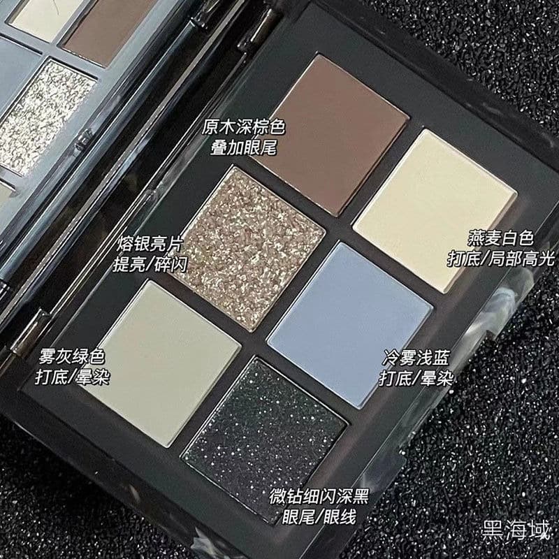 Black Swan Six-Color Eyeshadow Palette with Matte and Shimmer Finishes, Smoky Blue Cut-Crease Look for a Cool, Aloof Style
