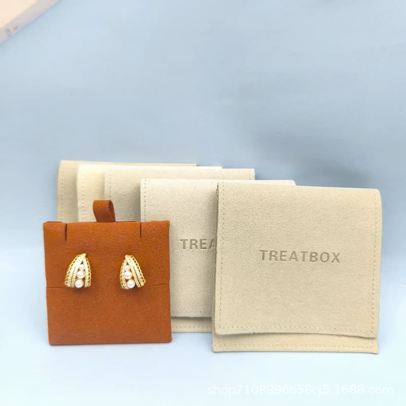 Professional custom ultra-fiber flip-top bags, 12-year source factory bracelet ring packaging bags, free samples available with logo printing.