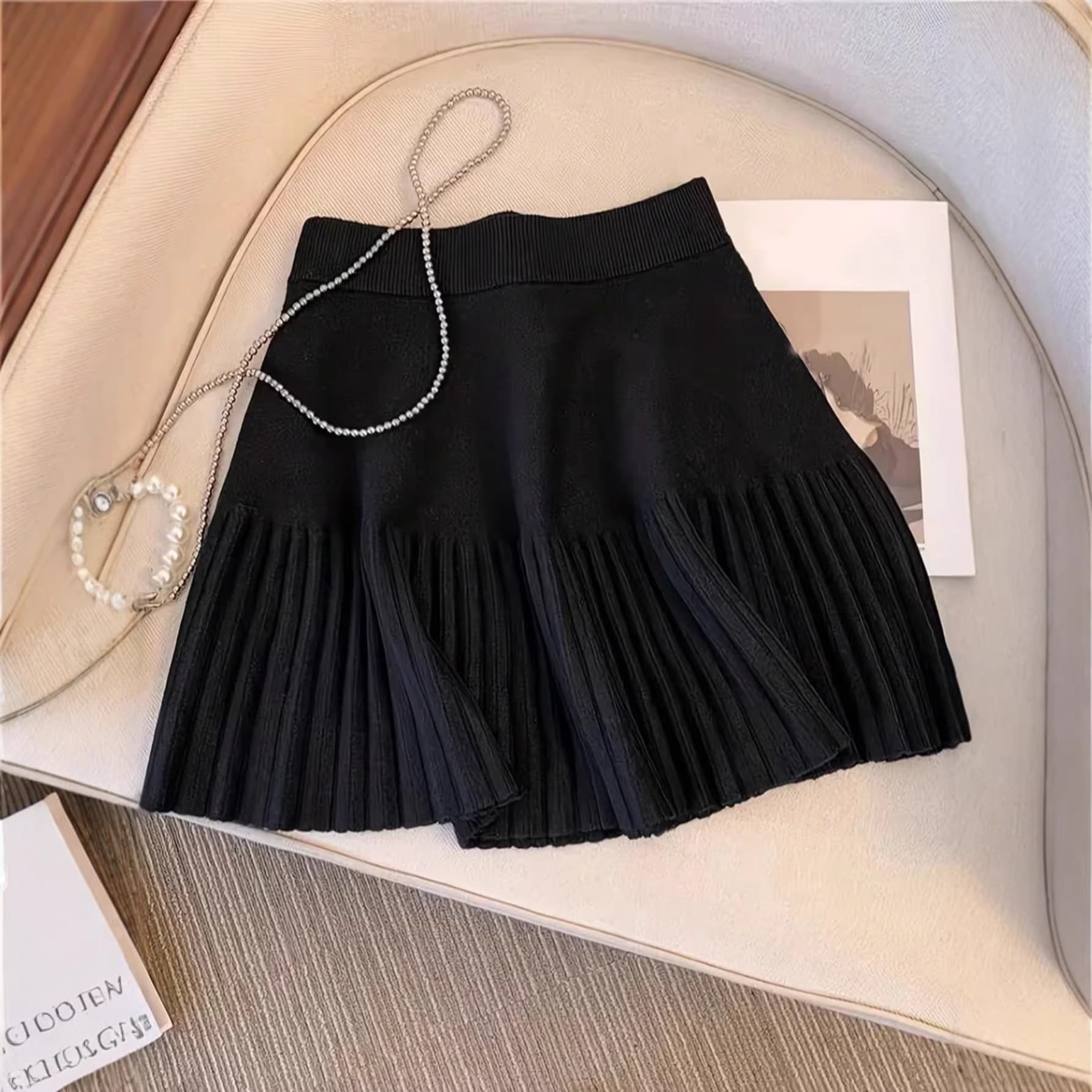 European and American cross-border spring, summer, and autumn women's elegant casual knitted short skirt, stylish pleated A-line half-length wool skirt