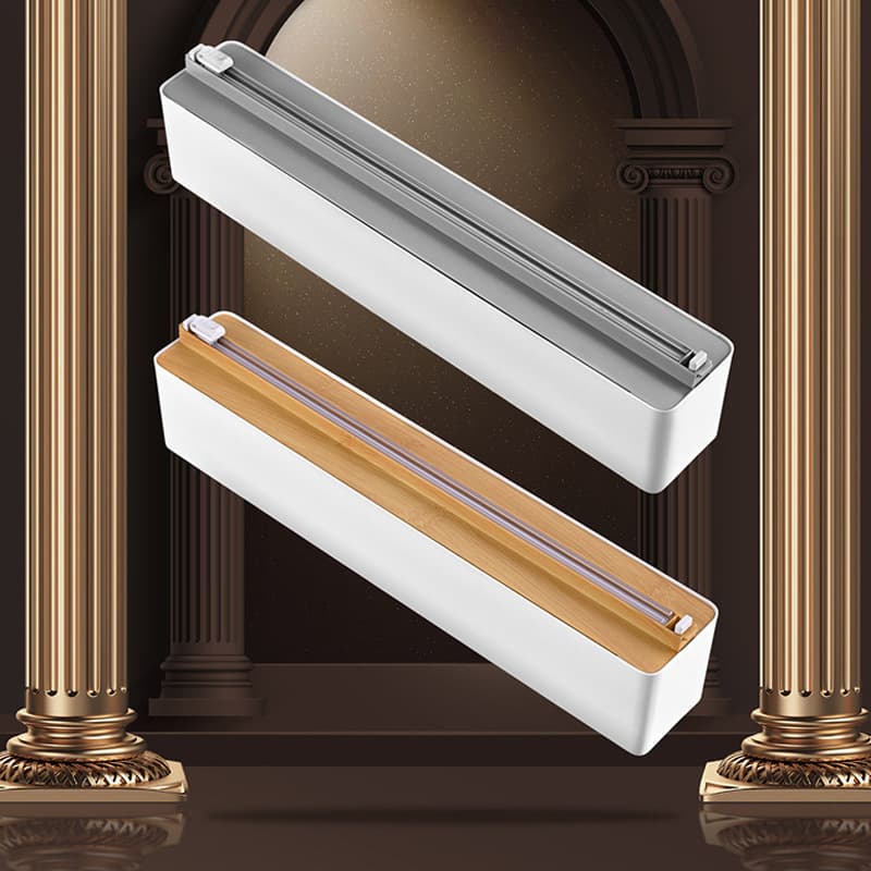 Kitchen cling film cutter with suction cup guide rail cutter, foil and cling film divider box, adjustable cutting.