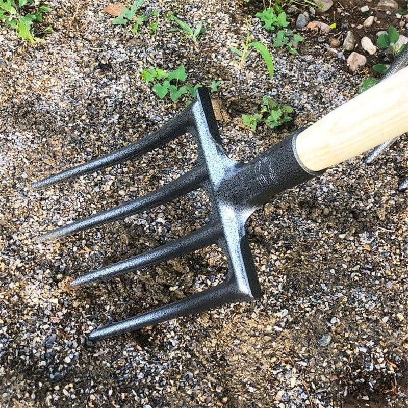 Wholesale thickened manganese steel integrated four-pronged and five-pronged steel forks for tilling soil, thickened all-steel forks for digging onions, garlic, and ginger.