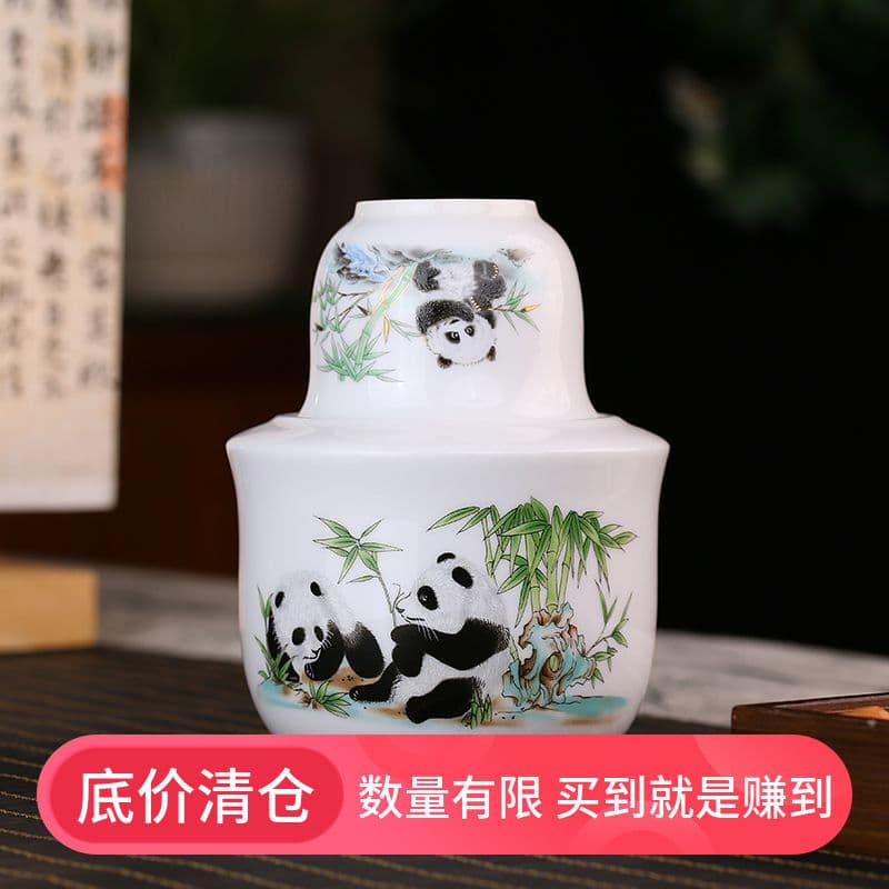 Dehua white porcelain wine warmer set, traditional Chinese yellow rice wine heating kit with blue-and-white cups.