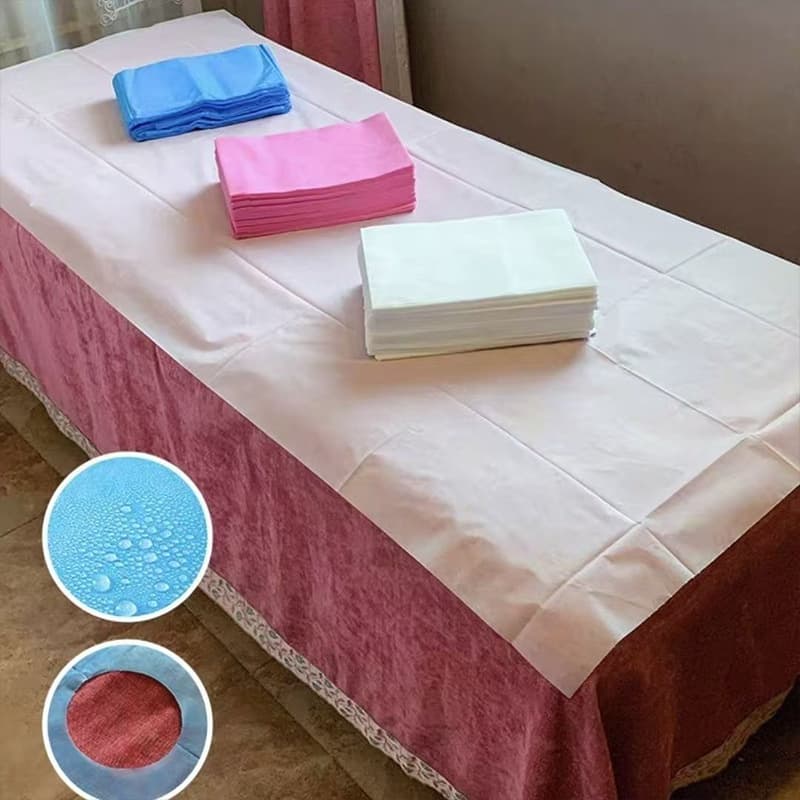 Wholesale disposable sheets waterproof and oil-proof thickened breathable beauty salon sheets with holes non-woven massage mattress sheets