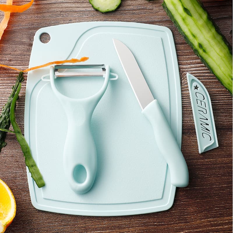 Fruit knife three-piece set with cutting board, stainless steel creative peeler, multi-functional kitchen gadget.