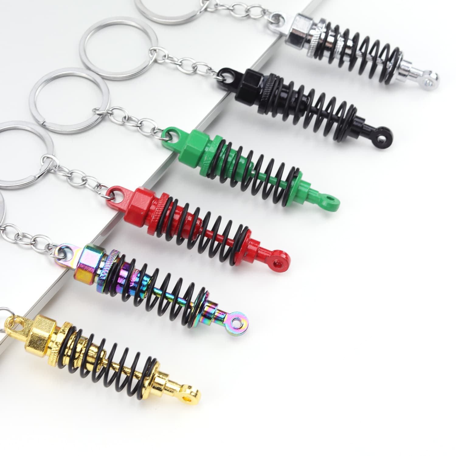 Car shock absorber keychain modified spring keychain metal model keychain pendant 4S store gift cross-border