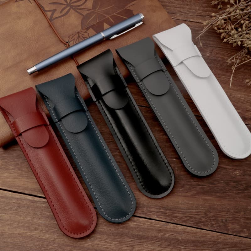 New product, simple solid color PU pencil bag, business portable, high-looking protective cover, flip-top storage pencil bag, engraved with logo text