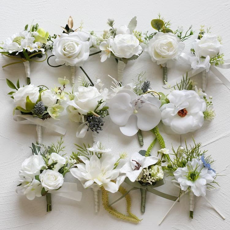 White artificial roses for brides, bridesmaids, wedding wrist corsages, grooms, best men's corsages for events, graduation ceremonies, banquets, and more.