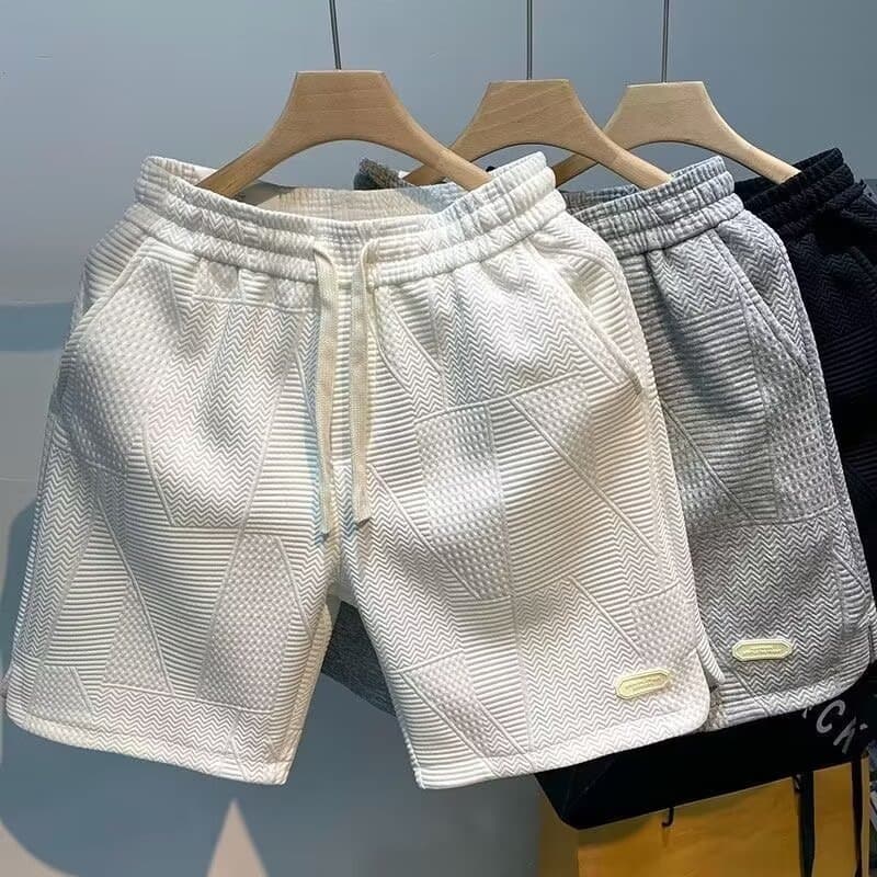 New men's shorts for summer outer wear, trendy brand slit five-quarter pants, handsome casual mid-pants, Korean version foreign trade wholesale