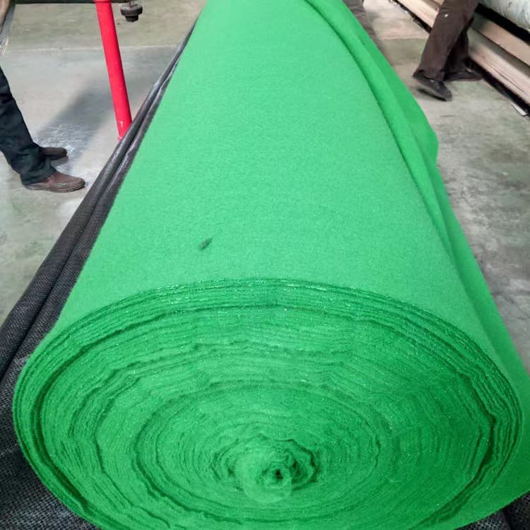Non-woven geotextile from Chengdu, Sichuan, available in white, green, and red for road maintenance, dust prevention, and water-permeable soil protection.