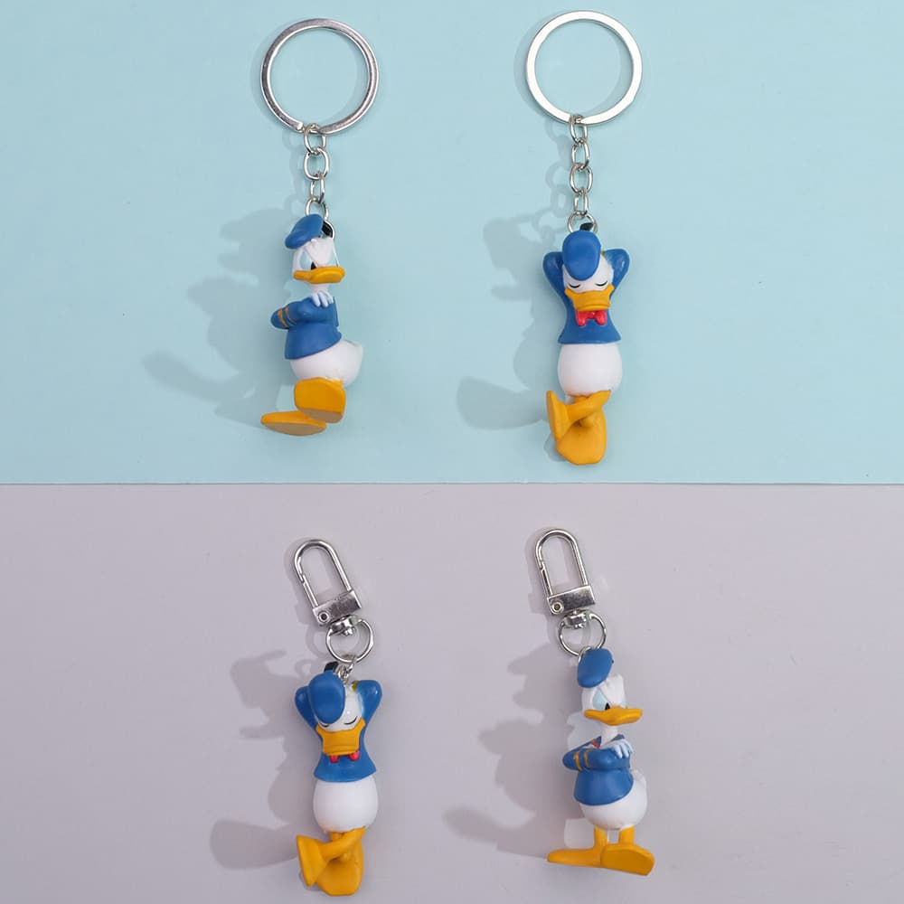 Three-dimensional cartoon duck keychain ring chain pendant love buckle gift wholesale foreign trade hot-selling earphone shell pendant