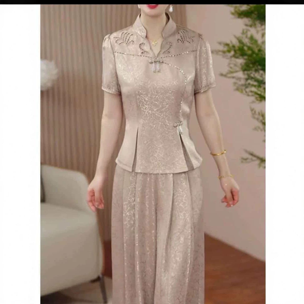 High-end foreign-style two-piece set for women 2026 new summer style temperament age-reducing and flesh-covering tops and pants fashion suit