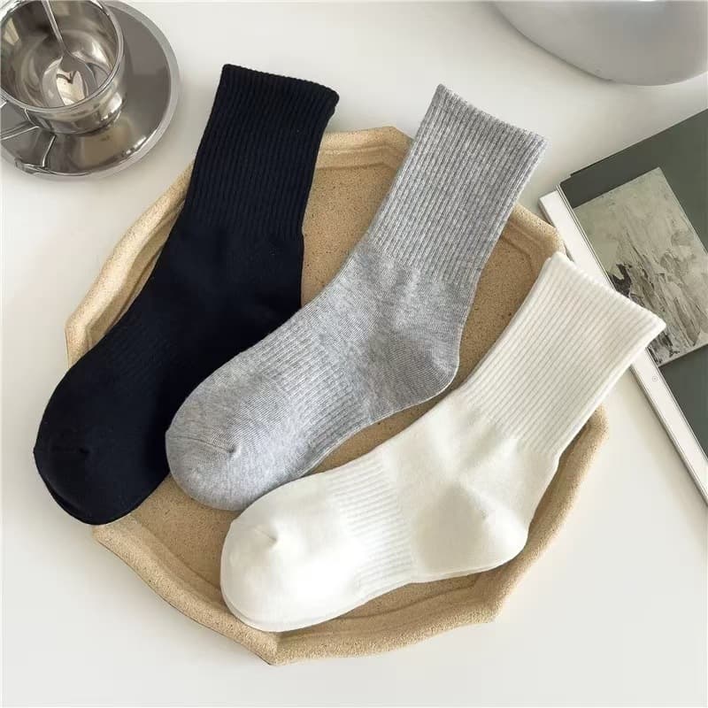 Unisex classic black, white, and gray long socks, solid color waistband anti-slip mid-calf sports socks, versatile casual breathable cotton.