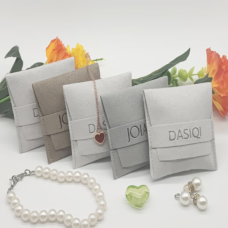 Embossed icon genuine microfiber snap-button tie-flap jewelry bags, earring necklace envelope storage, shop recommended