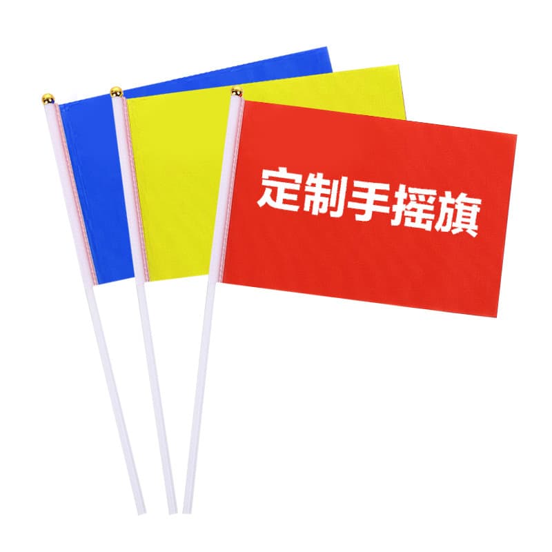 Colorful festival hand-waving flags for sports events, small red competition hand flags.