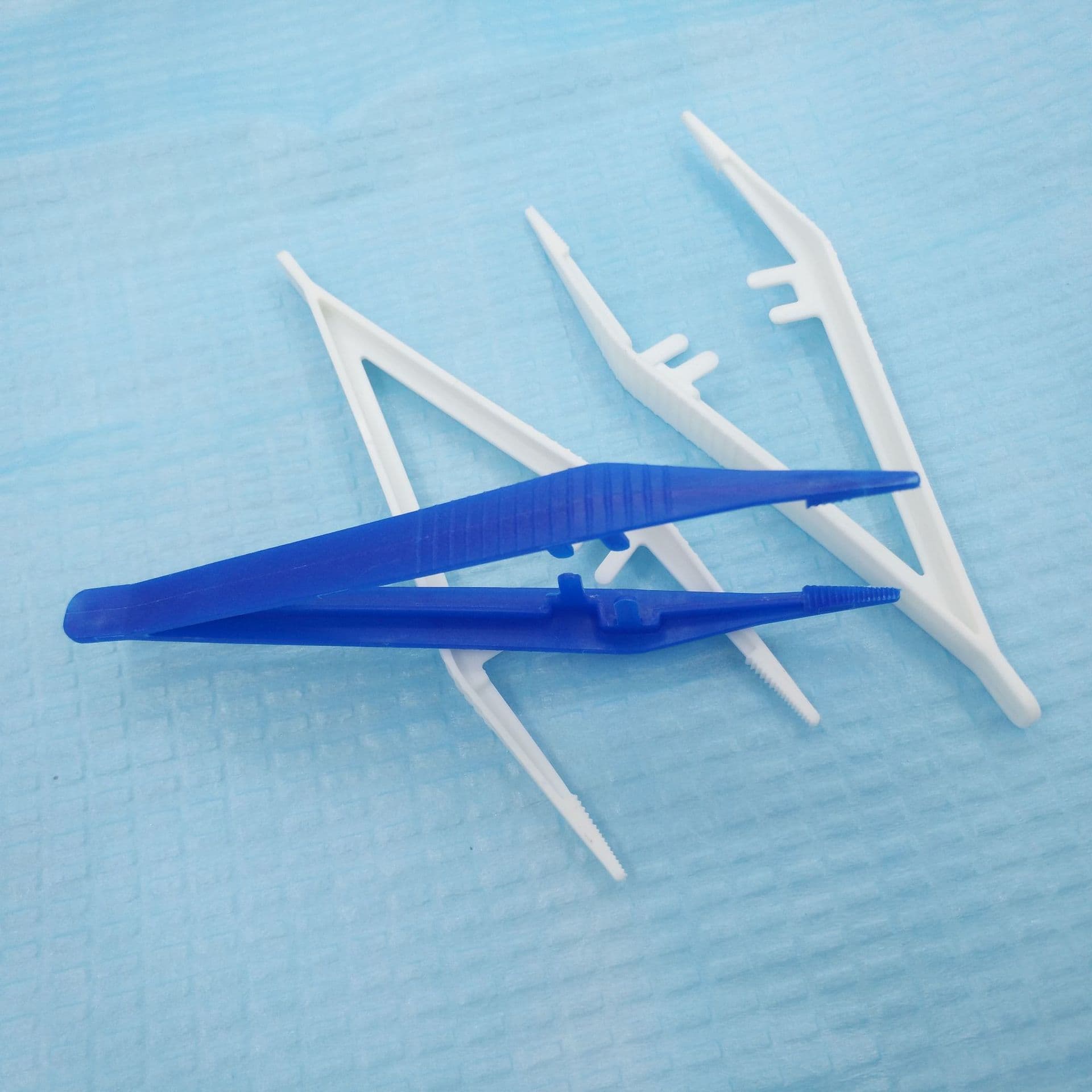 Flat-tip tweezers for children's sensory integration training, first-aid kits, DIY storage, and fine motor skill development.