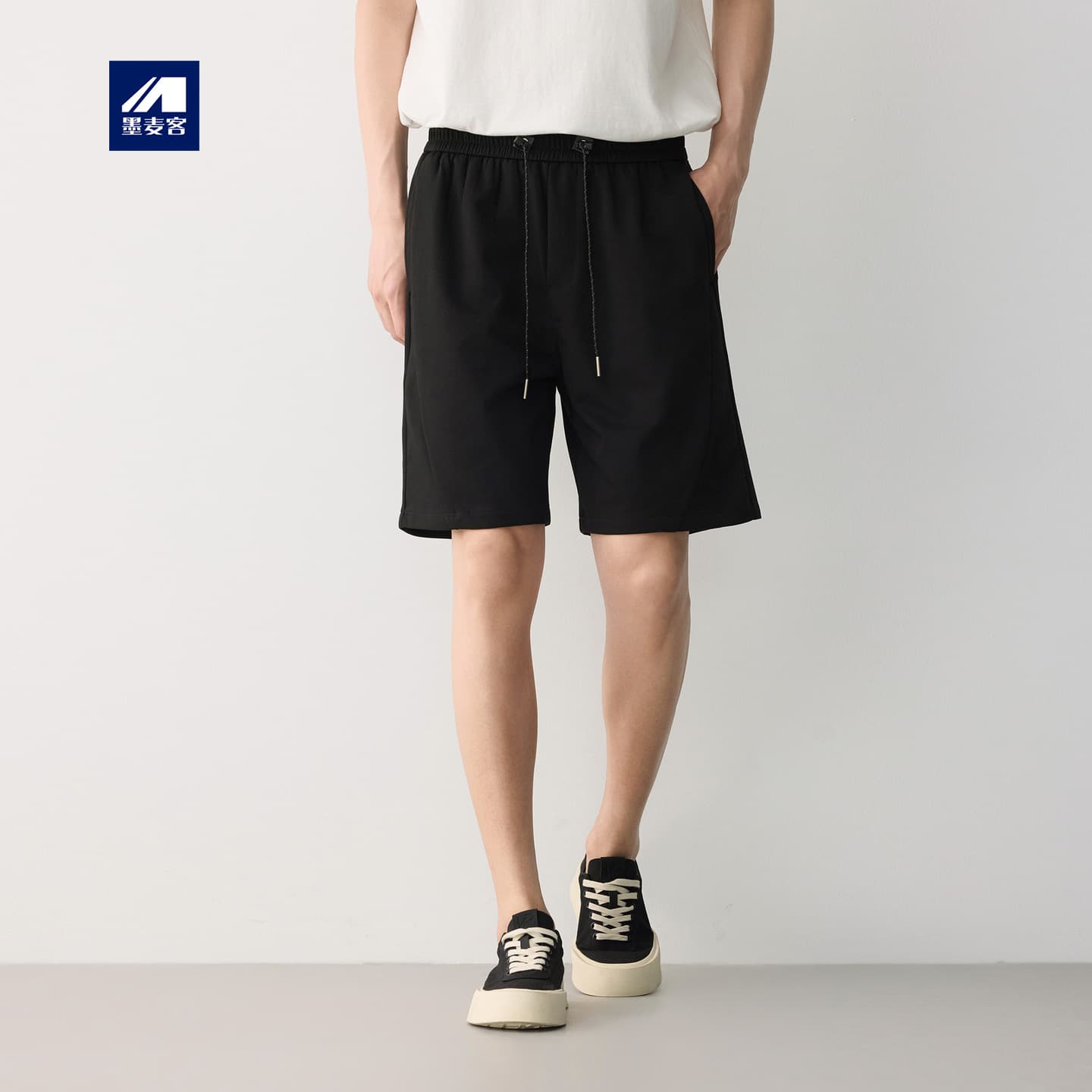 Momax Gaozhi commuting elastic drawstring men's shorts 2026 summer new style spliced five-quarter pants men 91807