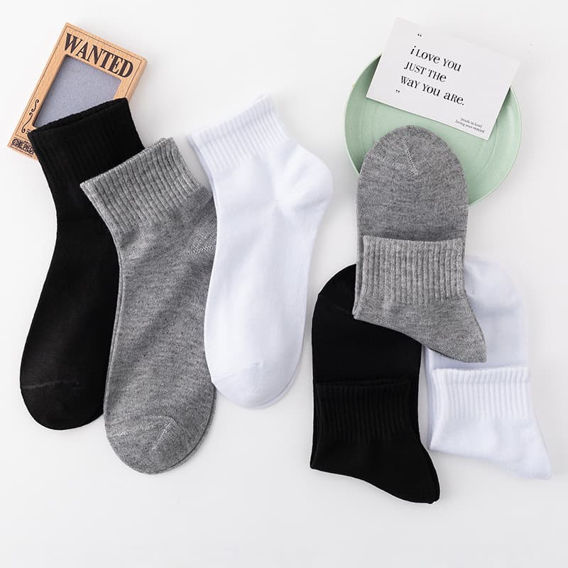 Black white gray mid-calf socks men's solid color stall socks wholesale bathroom trampoline disposable socks outdoor floor socks