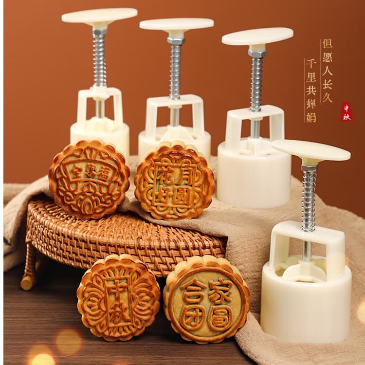 High-quality, aesthetically pleasing snow skin mooncake molds for the Mid-Autumn Festival 2025, featuring designs of flowers and a full moon, and tableware for family reunion.
