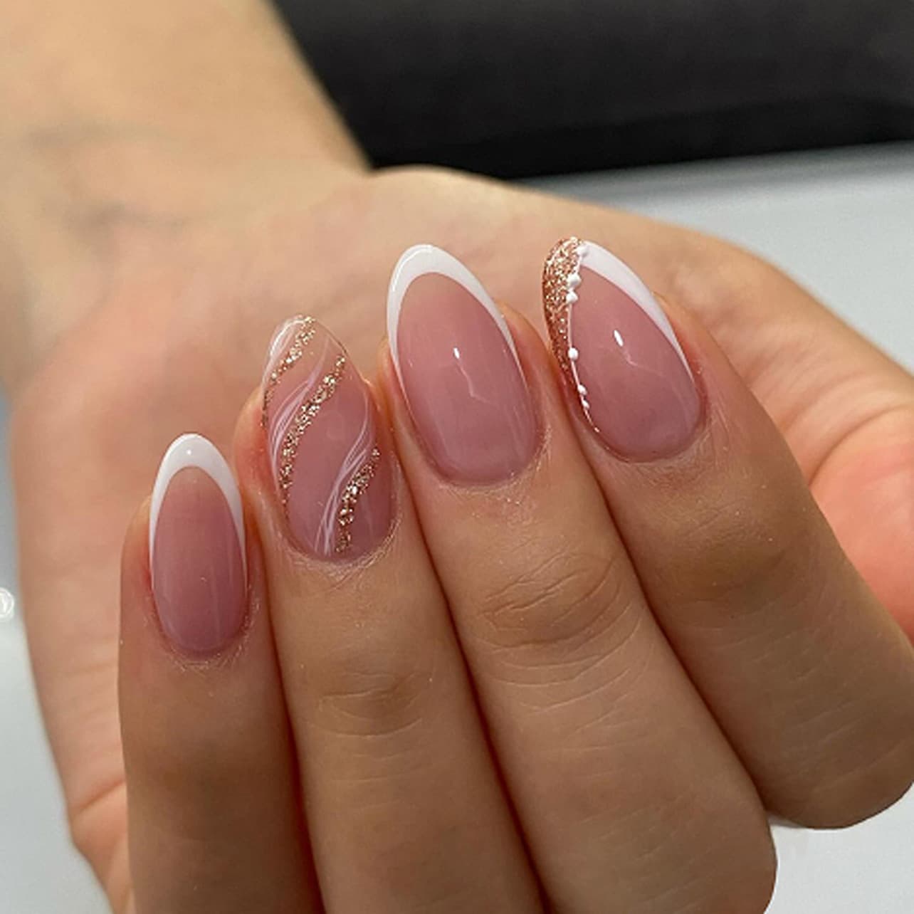 Classic white French manicure, simple short almond-shaped wear nails, silver glitter wavy stripes fake nails