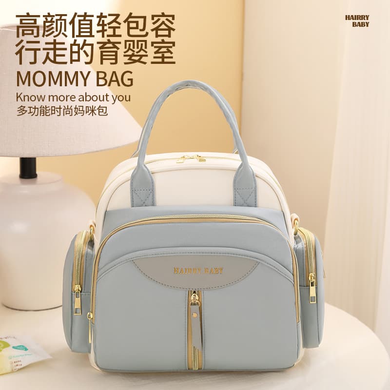 Multifunctional mommy bag 2025 new large-capacity backpack can be worn cross-body, portable baby supplies mother and baby bag
