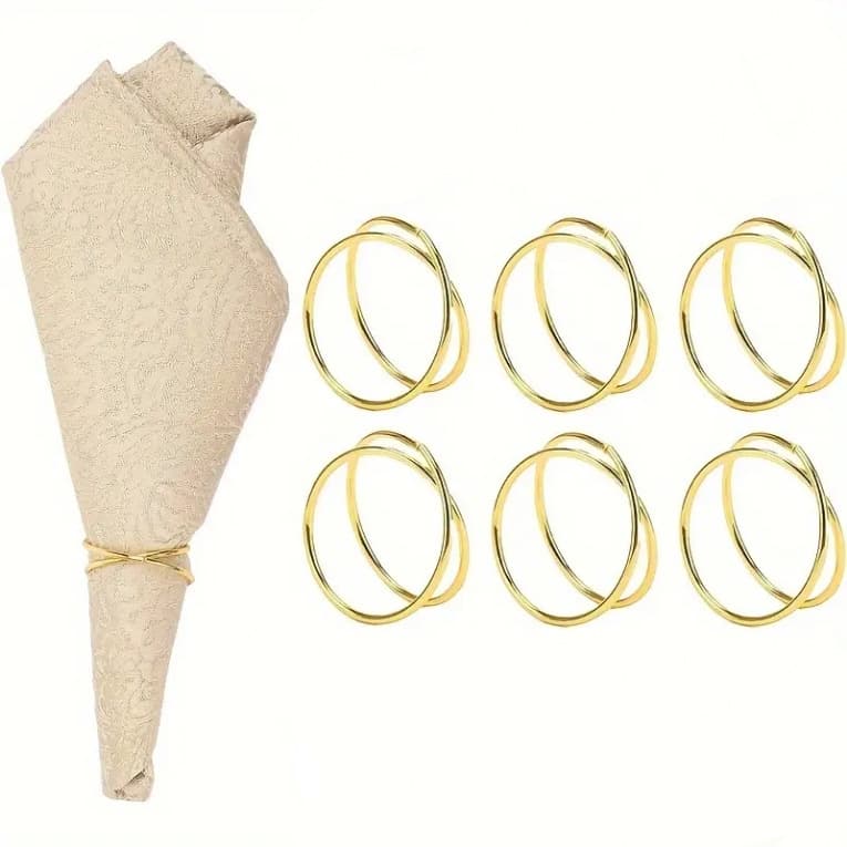 Hotel gold napkin clips, napkin rings, napkin loops, open metal napkin rings, table decorations.