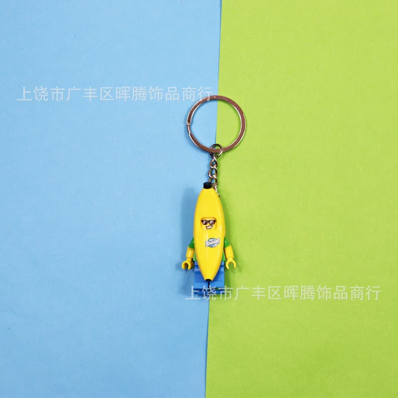 Cross-border Hot Sale Banana Man Racing Man Elephant Girl Sausage Man Fire Dragon Man Building Block Keychain Pendant Wholesale