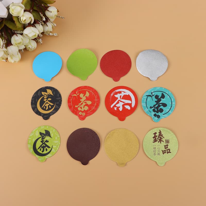 Factory direct sales of easy-open and easy-tear film for small jars of tea and flower tea, single-piece aluminum foil sealing film for jars and cans.