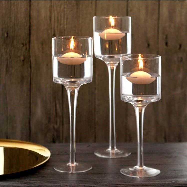 Manufacturer supplies hand-blown glass candlesticks, European-style restaurant wine glasses and candlestick sets (three pieces).